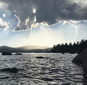 sunset and storm clouds over lake tahoe