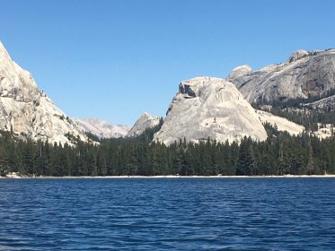 granite dome above kayak in yosemites tenaya lake